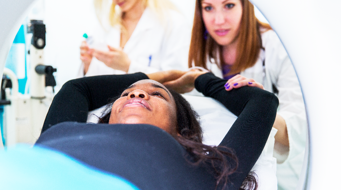 female patient getting heart scan in x-ray tube
