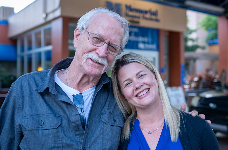 Michael and Tiffany in front of Memorial Hospital Pembroke